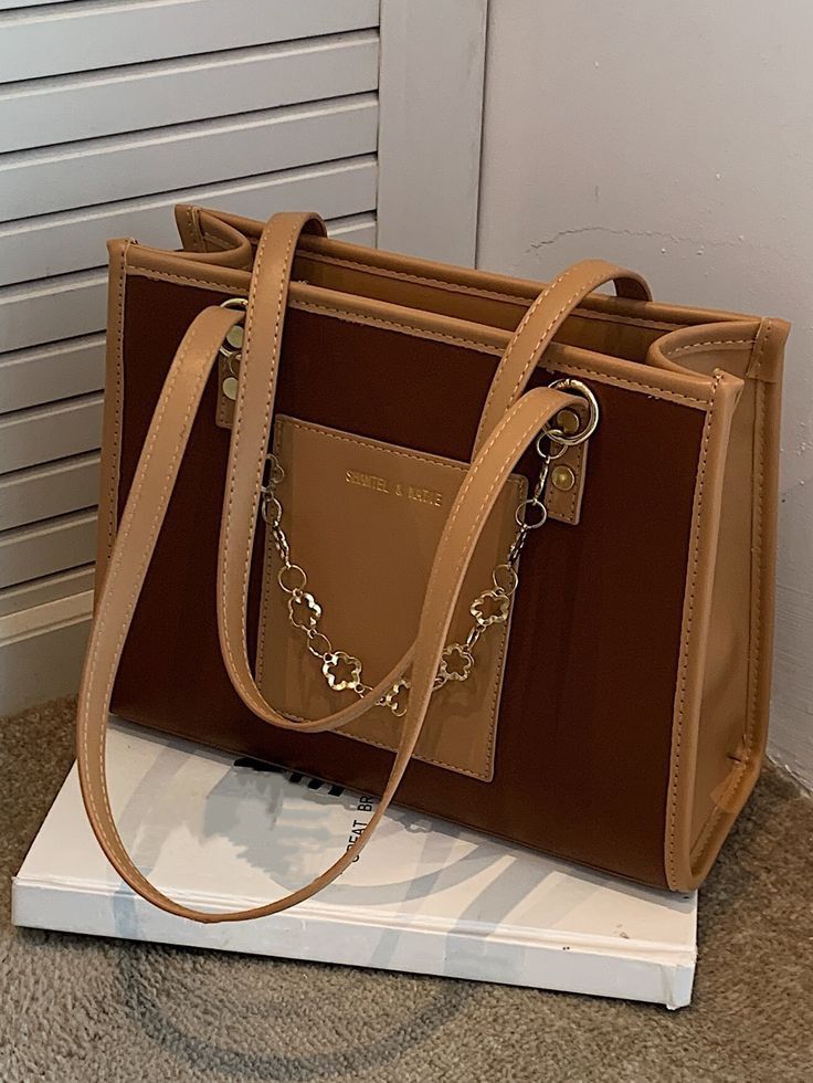 Structured Two-Tone Brown Tote Bag with Floral Chain Accent